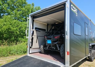 Close-up of a razor loaded inside a CORE RV toy hauler.